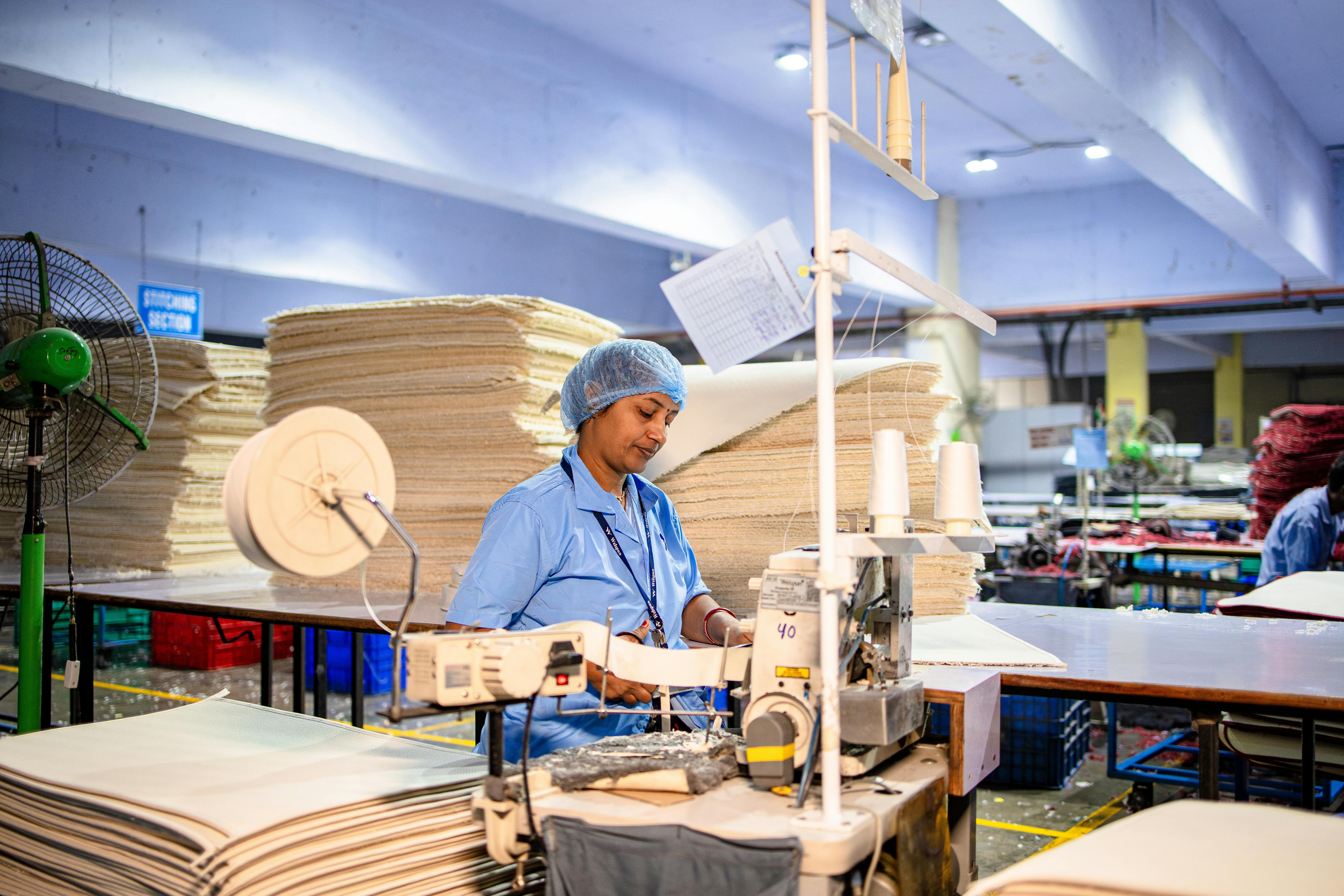Heavy-duty canvas and duck fabric rolls in warehouse
