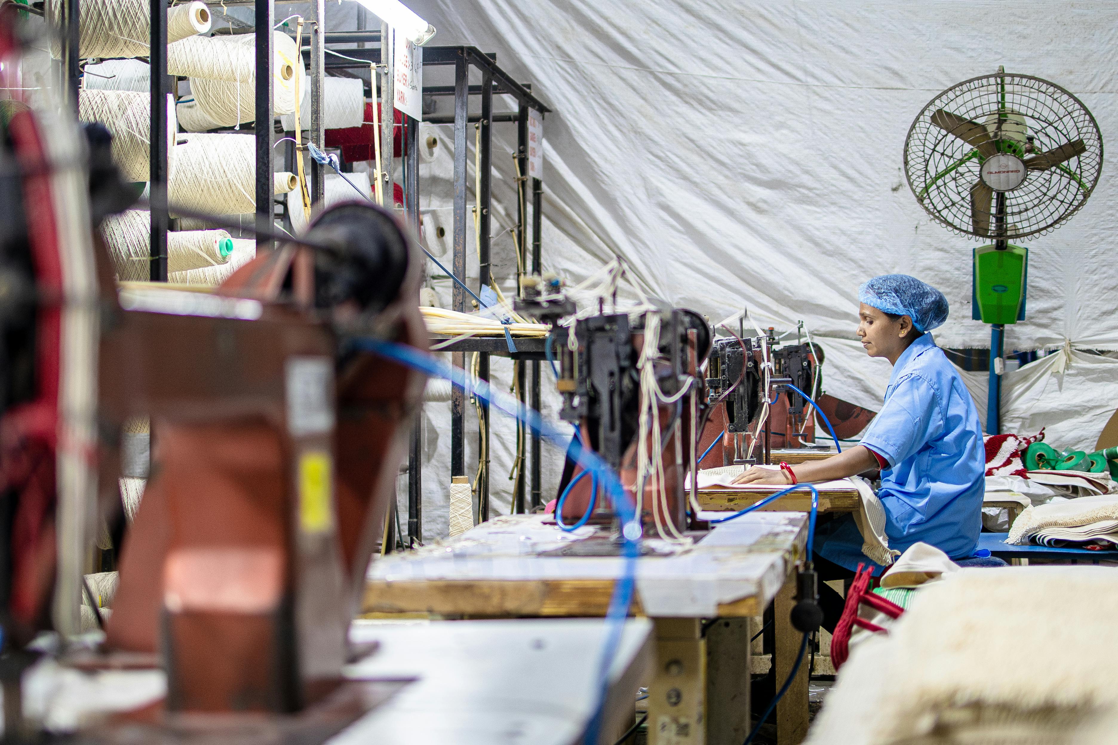 Cotton and synthetic fabric production in manufacturing facility